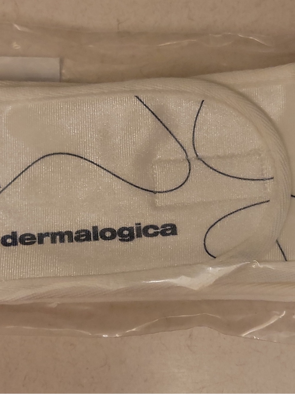 Dermalogica White Skincare Headband with Navy Accents